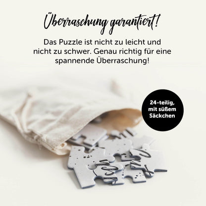 24-teiliges Gutschein Puzzle im Stoffbeutel, kreative Geschenkidee für besondere Anlässe.